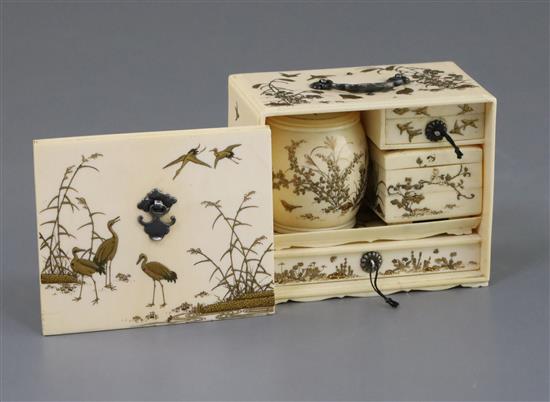A Japanese gilt lacquered ivory model of a picnic set (Sage Jubako), Meiji period, H. 7cm, W. 8.3cm